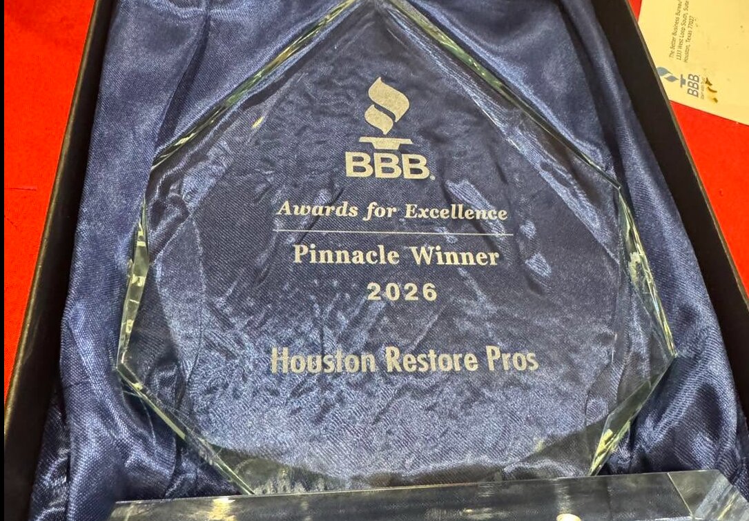 Juan Contreras of Houston Restore Pros celebrates the 2026 BBB Pinnacle Award in Houston, Texas 3